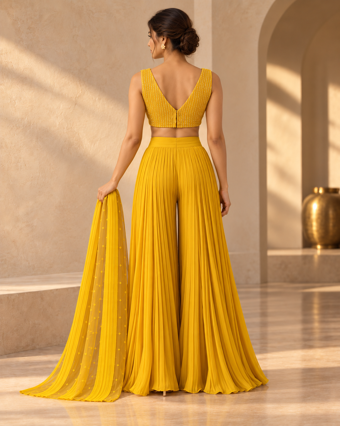 Solstice marigold pleated sharara set by Label Swatii Madhukar