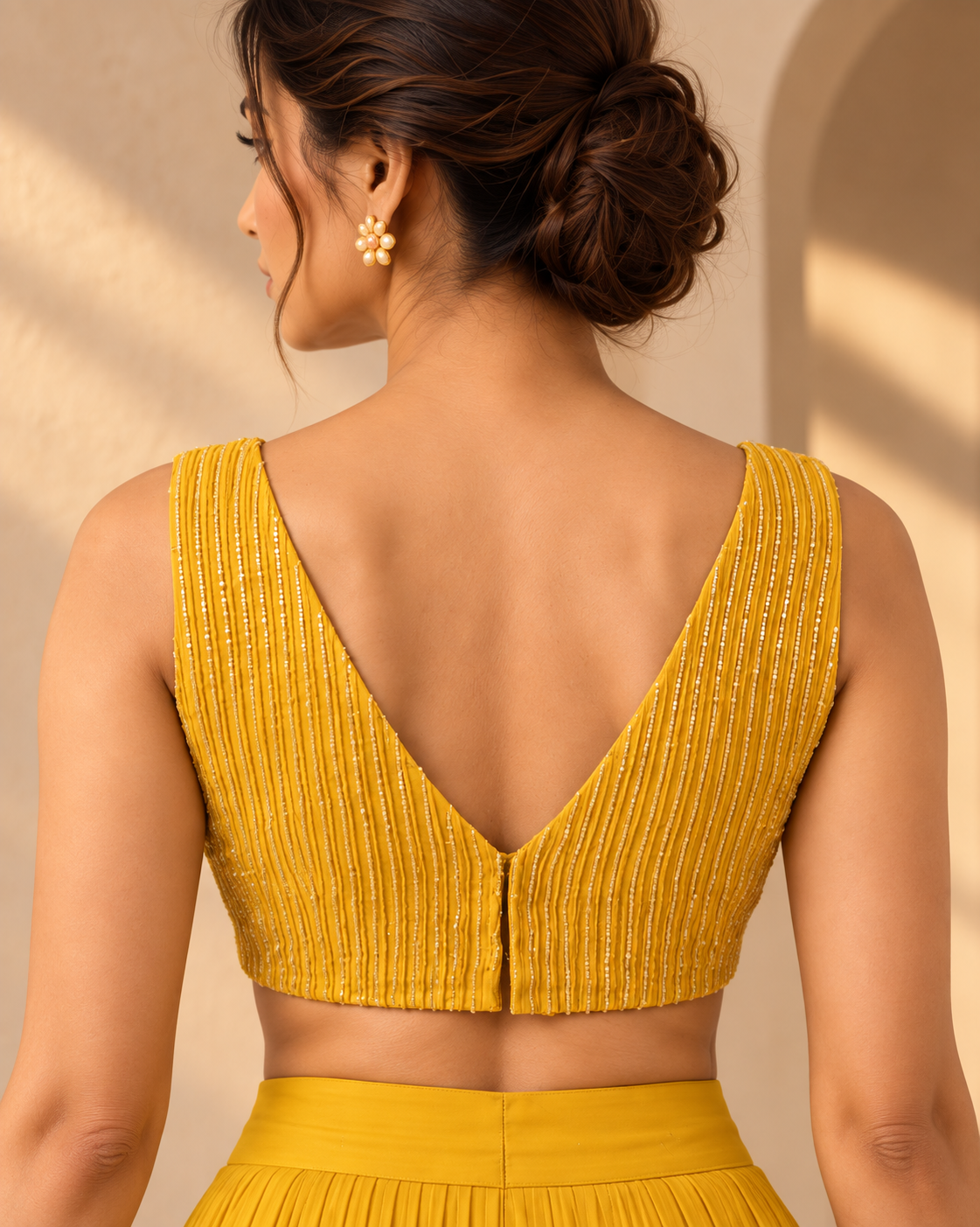 Solstice marigold pleated sharara set by Label Swatii Madhukar