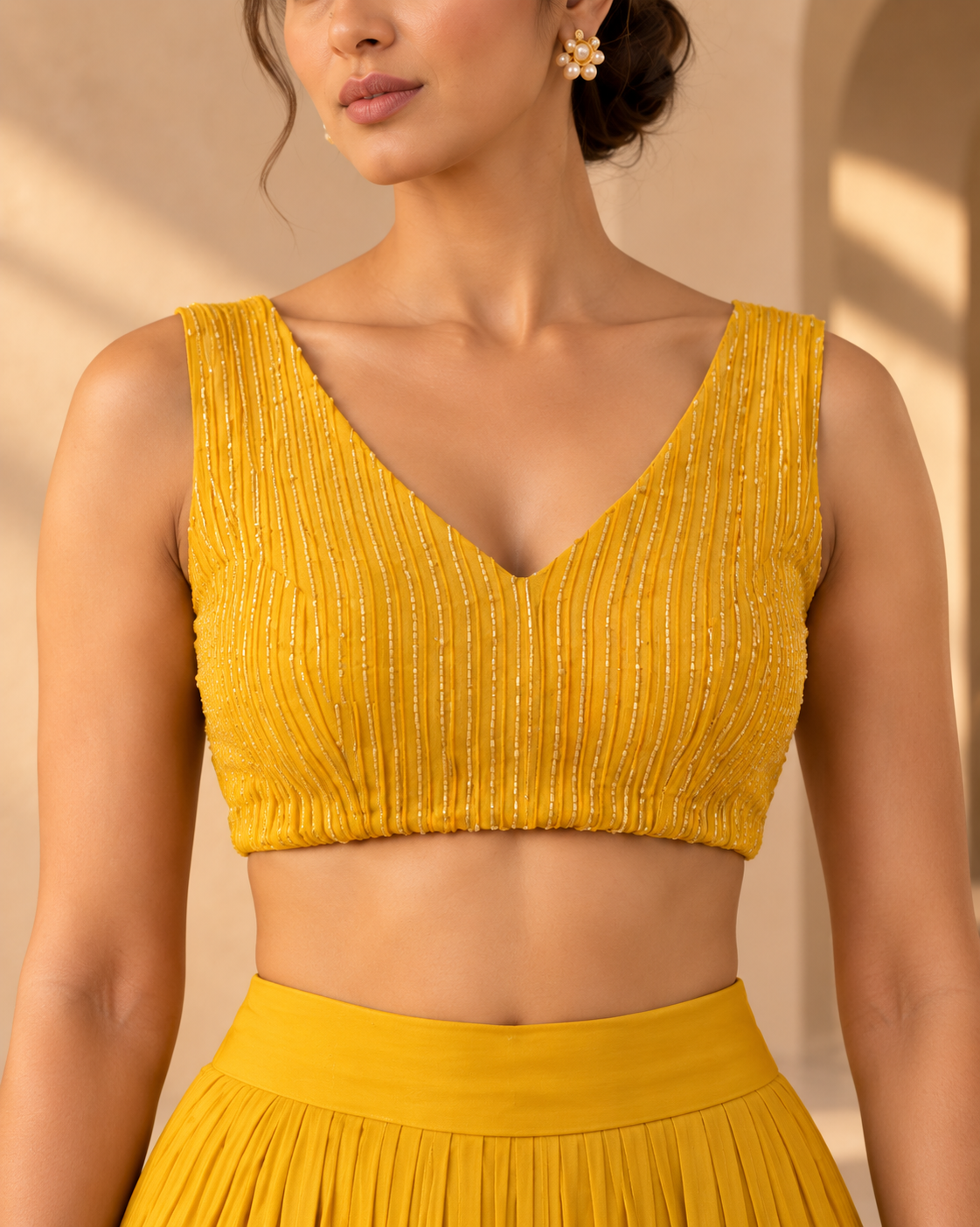 Solstice marigold pleated sharara set by Label Swatii Madhukar